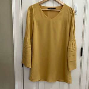 ARK & CO mustard yellow dress with layered flutter sleeve.